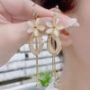 ¡JOYAS ELEGANTES! Pendientes Flor de Oro: Elegancia Natural